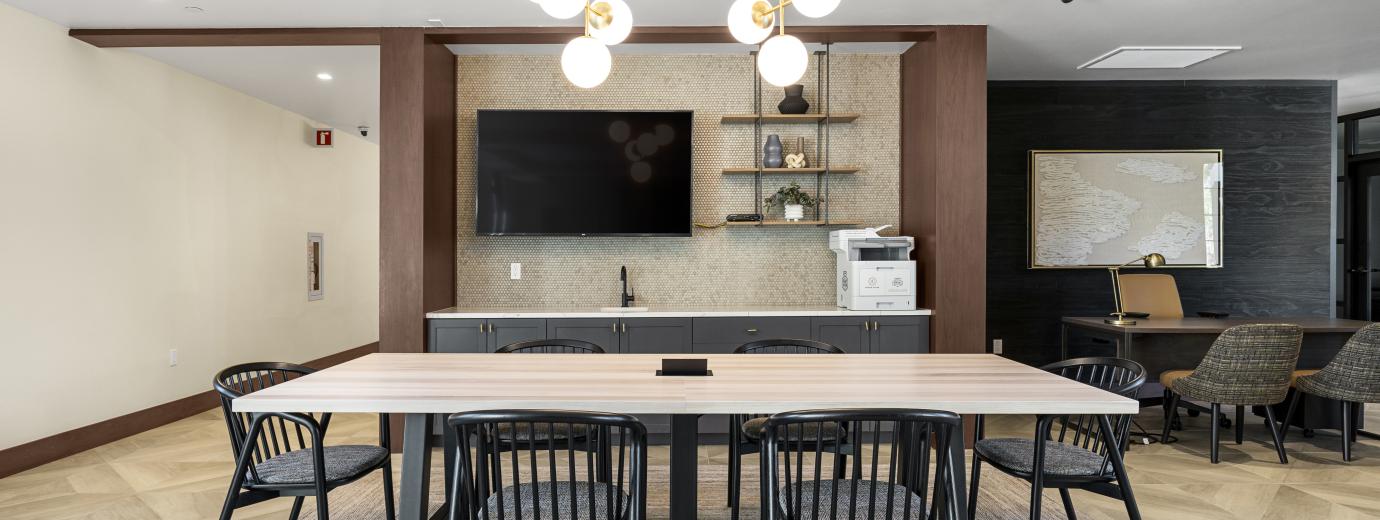 Leasing Office Table and TV